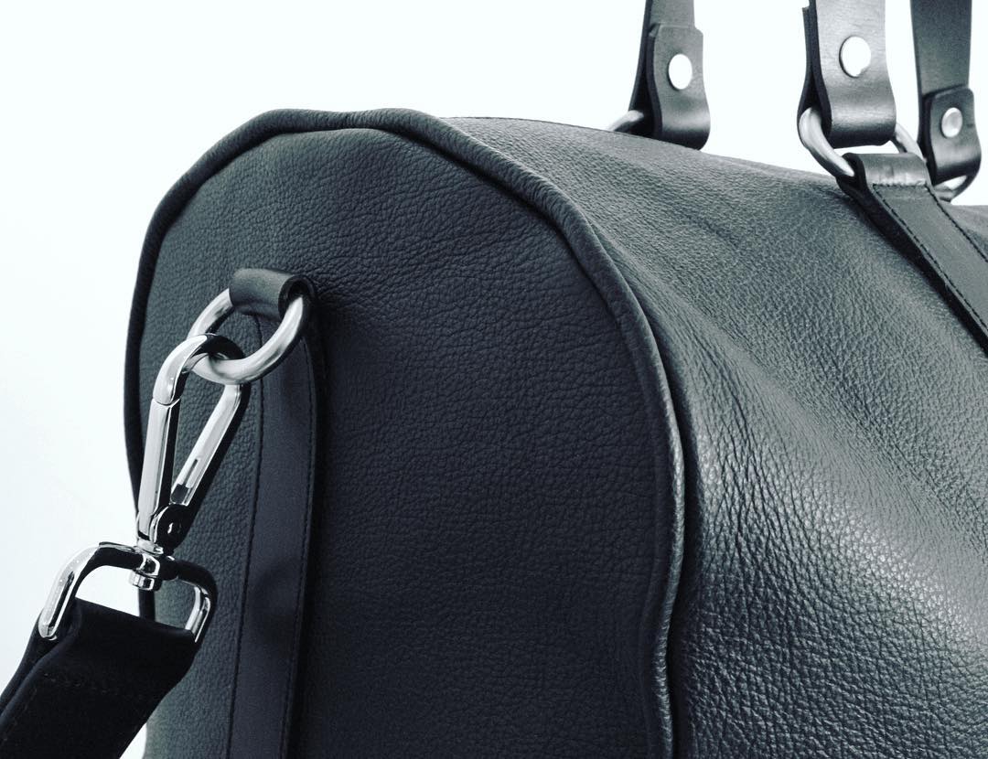 IX leather duffle bag